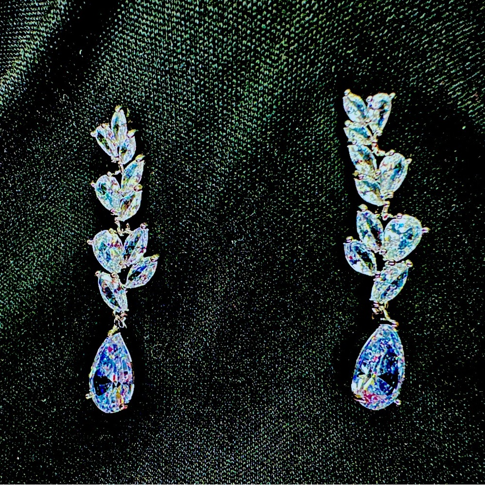 Sparkling Crystal Teardrops hanging from Leaf Vine